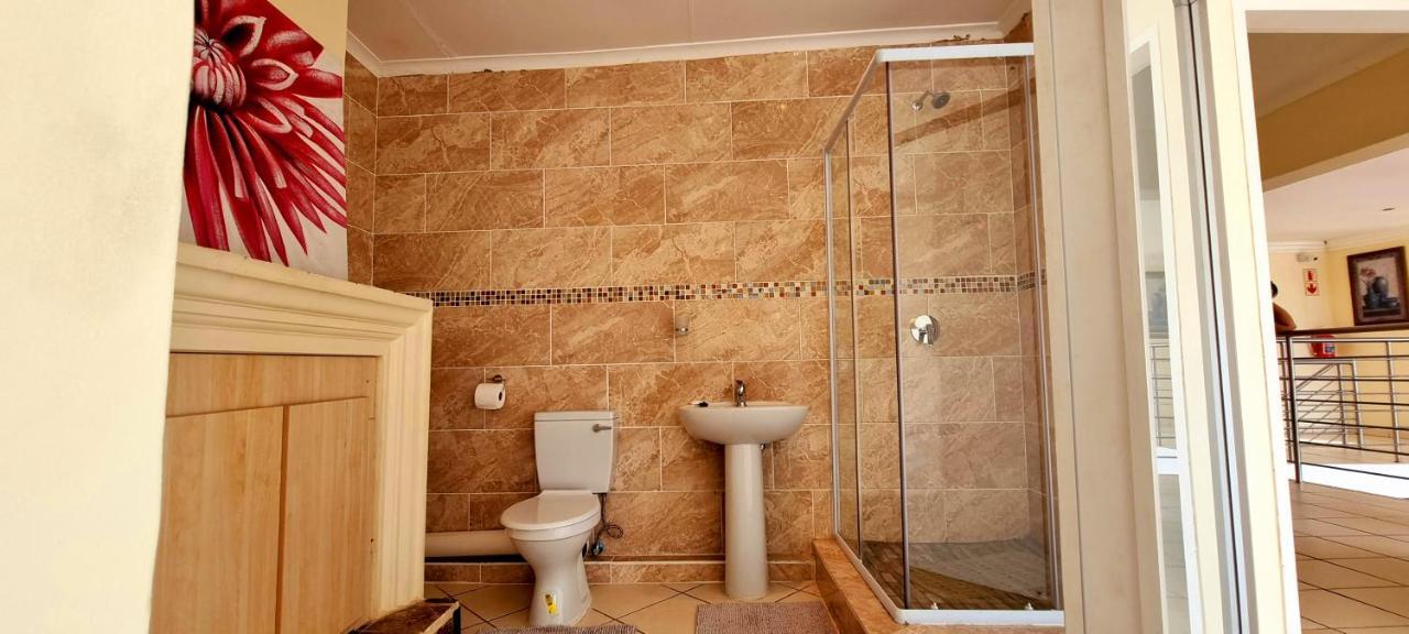 Asda Guesthouse Mogwase Esterno foto