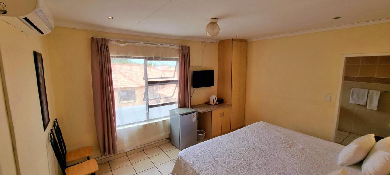Asda Guesthouse Mogwase Esterno foto